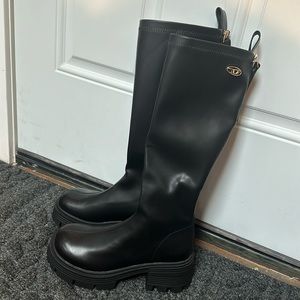 Faux leather knee high chunky boots. Never worn.